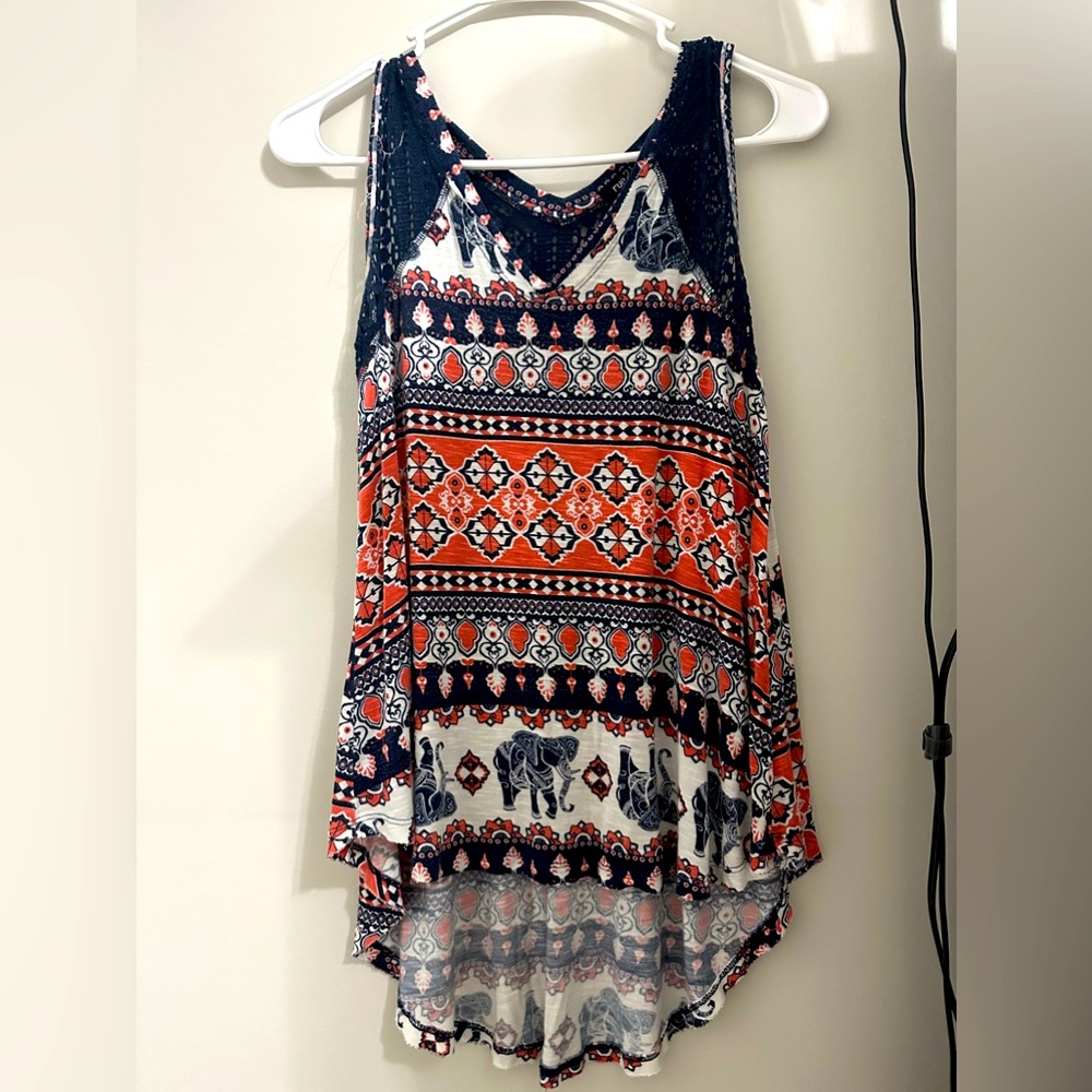 This top is used but has been rarely worn.